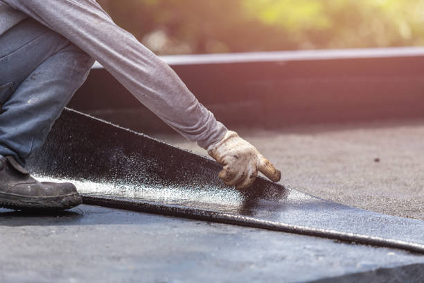 Professional Waterproofing technician working in Wild Rose, WI